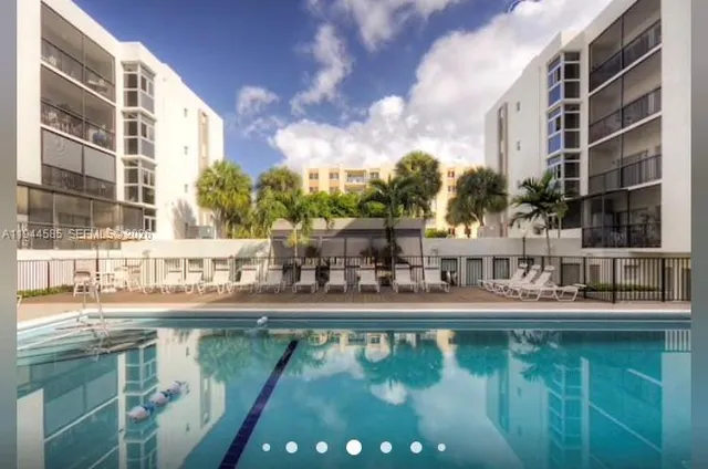 a house with river in front of it