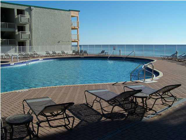 16819 Front Beach Road, Unit 1613 Panama City Beach, FL 32413 - Photo 5 of 8 a view of a backyard with furniture