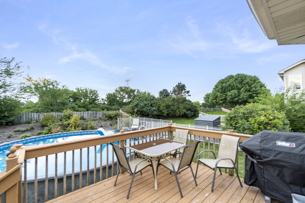 24849 Vermette Road Plainfield, IL 60585 - Photo 16 of 16 a view of a chairs and table on the deck