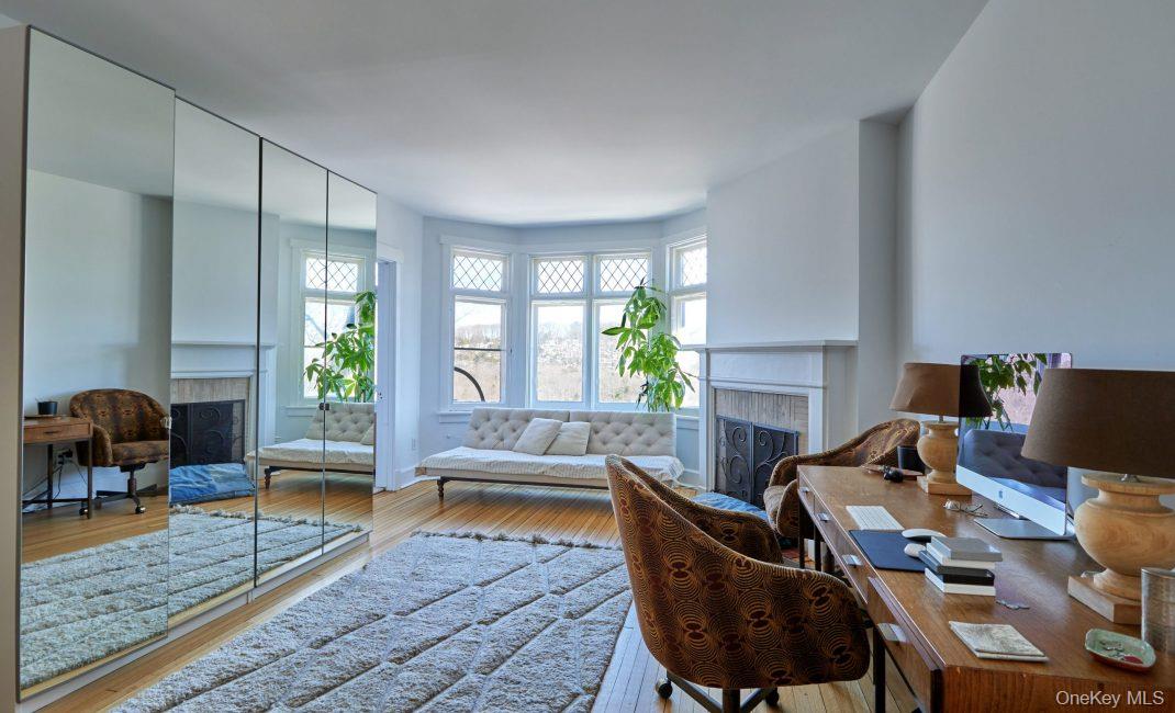 61 Crows Nest Road, Unit 5 Tuxedo Park, NY 10987 - Photo 7 of 16 a living room with furniture rug and window