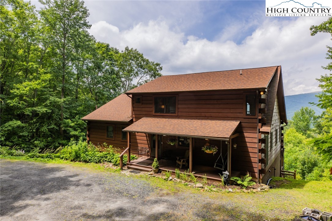 595 Little Squirrel Creek Road Newland, NC 28657 - Photo 5 of 49 an outdoor view of old house
