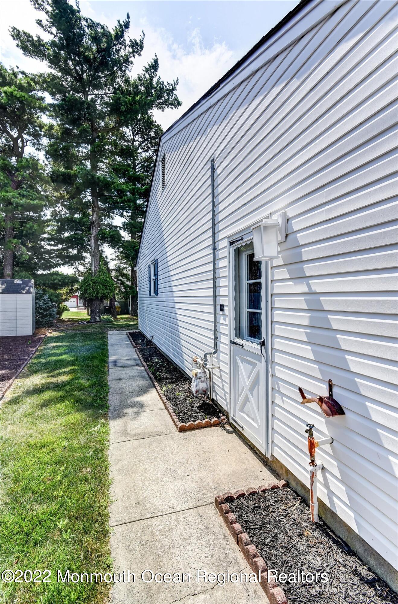 143 Castleton Drive Toms River, NJ 08757 - Photo 27 of 28 28-Side View