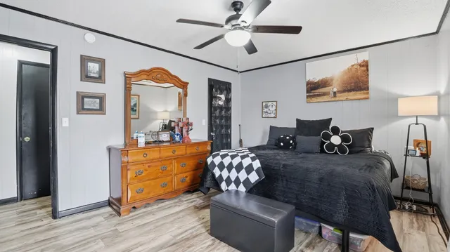 a bedroom with a bed and furniture