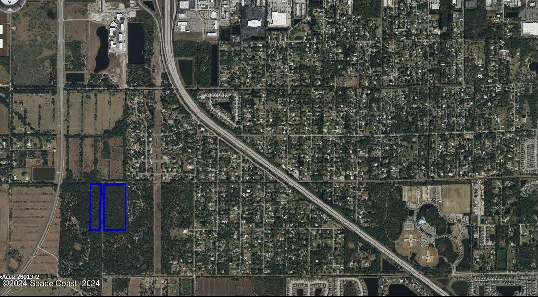 Undisclosed Address Melbourne, FL 32904 - Photo 3 of 10 a city view from a balcony