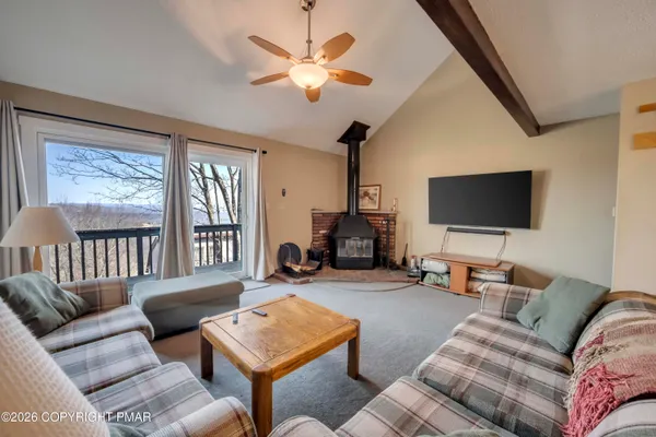 a bedroom with a bed and a night stand
