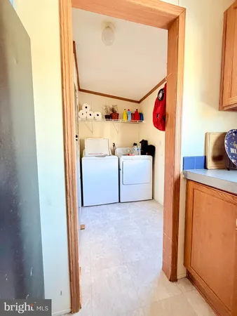 a view of hallway with wooden floor
