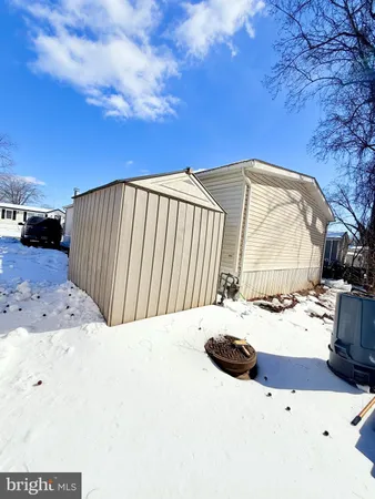 a view of a backyard of the house
