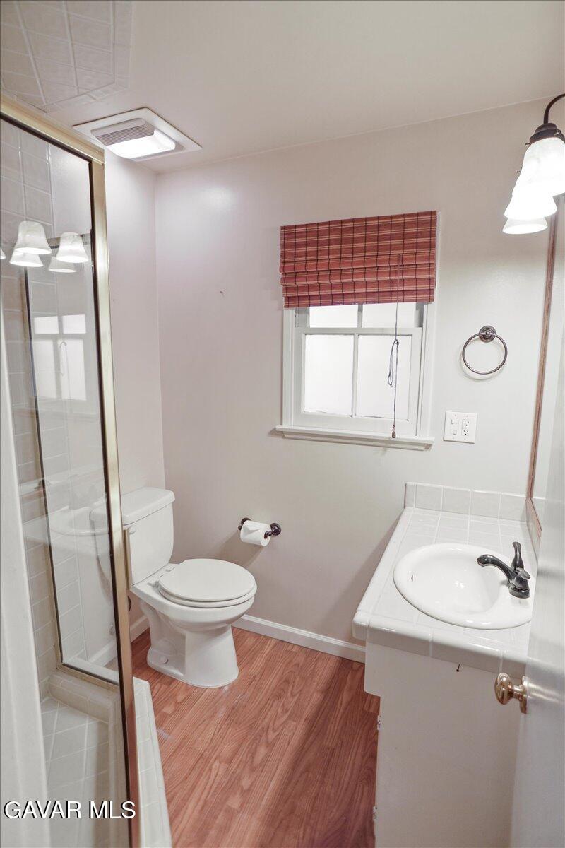 719 West Ave J-10 Lancaster, CA 93534 - Photo 12 of 21 a bathroom with a sink toilet and shower