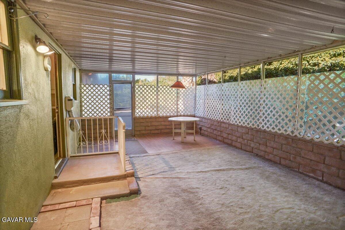 719 West Ave J-10 Lancaster, CA 93534 - Photo 14 of 21 a view of a porch with wooden floor
