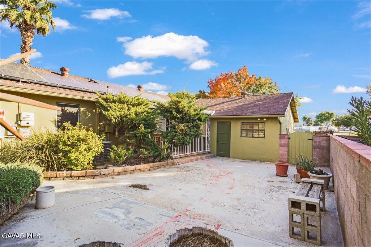 719 West Ave J-10 Lancaster, CA 93534 - Photo 20 of 21 a view of a house with a patio