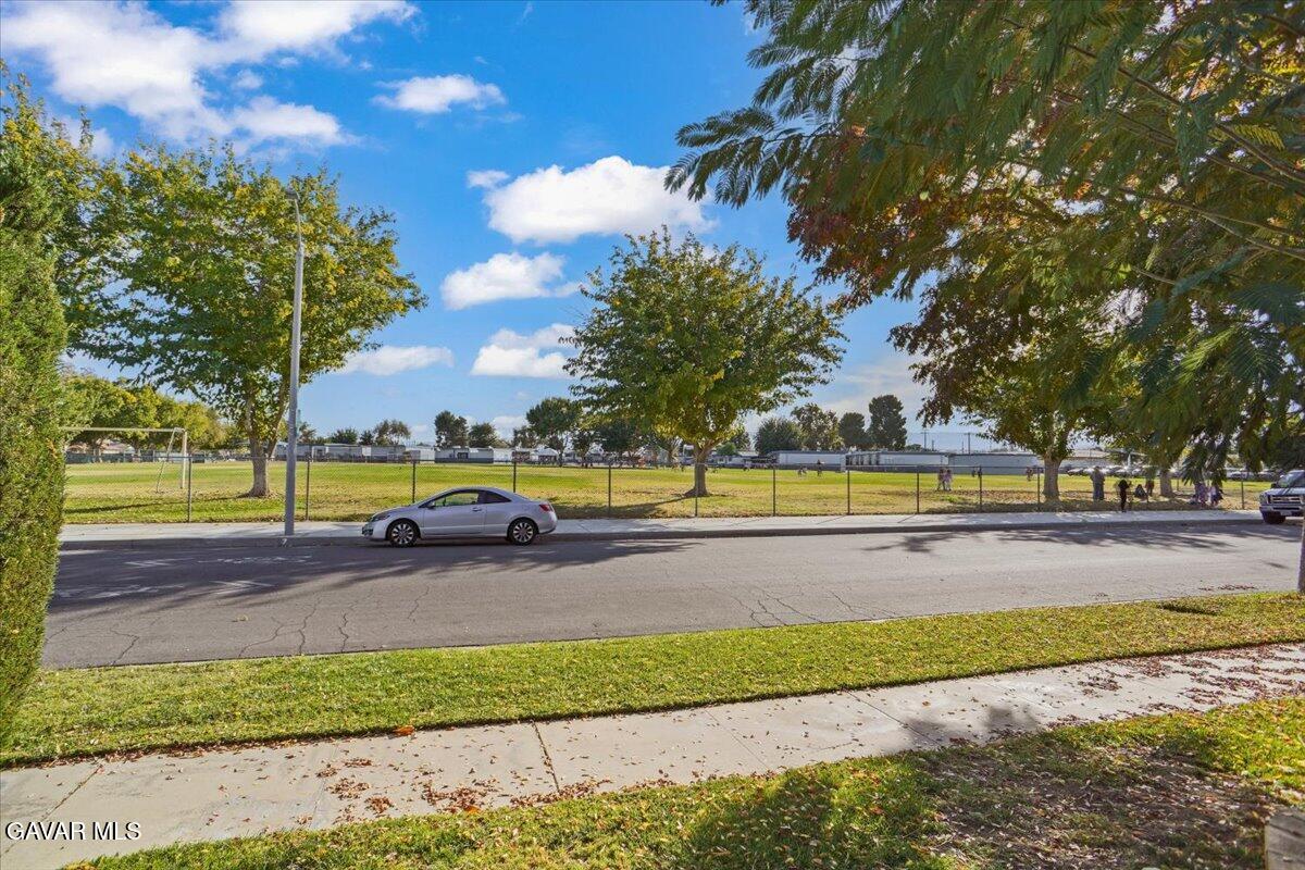 719 West Ave J-10 Lancaster, CA 93534 - Photo 21 of 21 a view of a swimming pool and an outdoor space