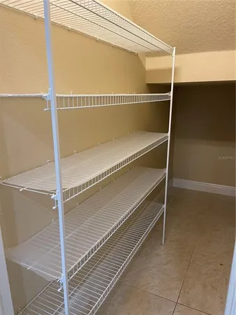 a balcony with a glass door