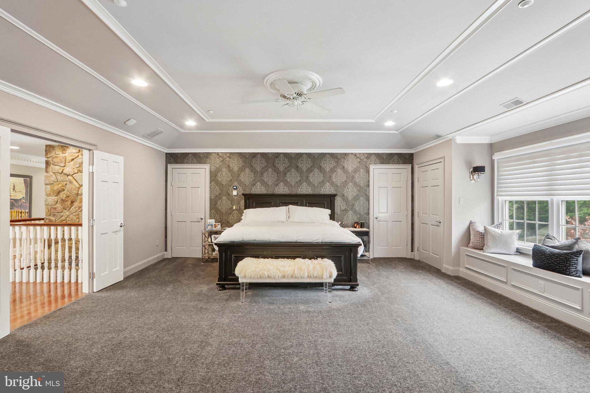209 Welsh Road Ambler, PA 19002 - Photo 32 of 80 a spacious bedroom with a bed and large window