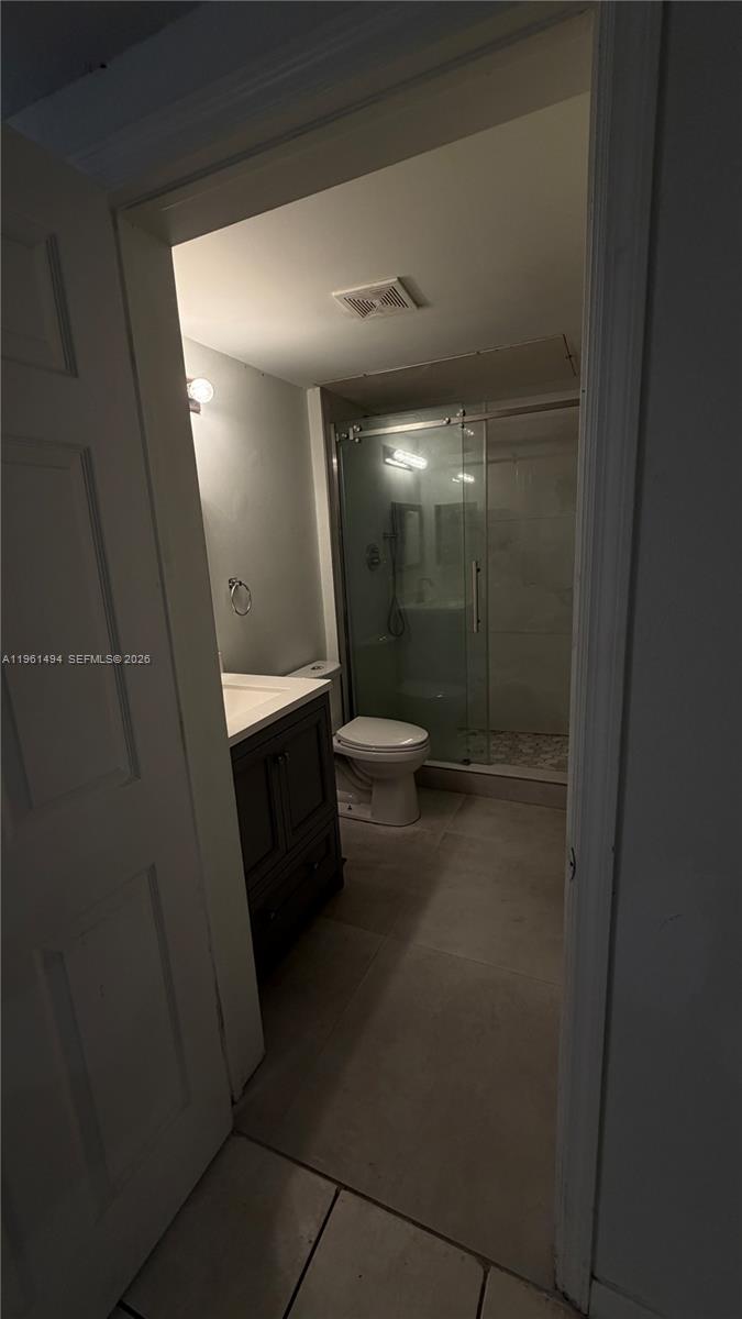 741 Southwest 148th Avenue, Unit 705 Sunrise, FL 33325 - Photo 28 of 32 a bathroom with a sink a toilet and shower