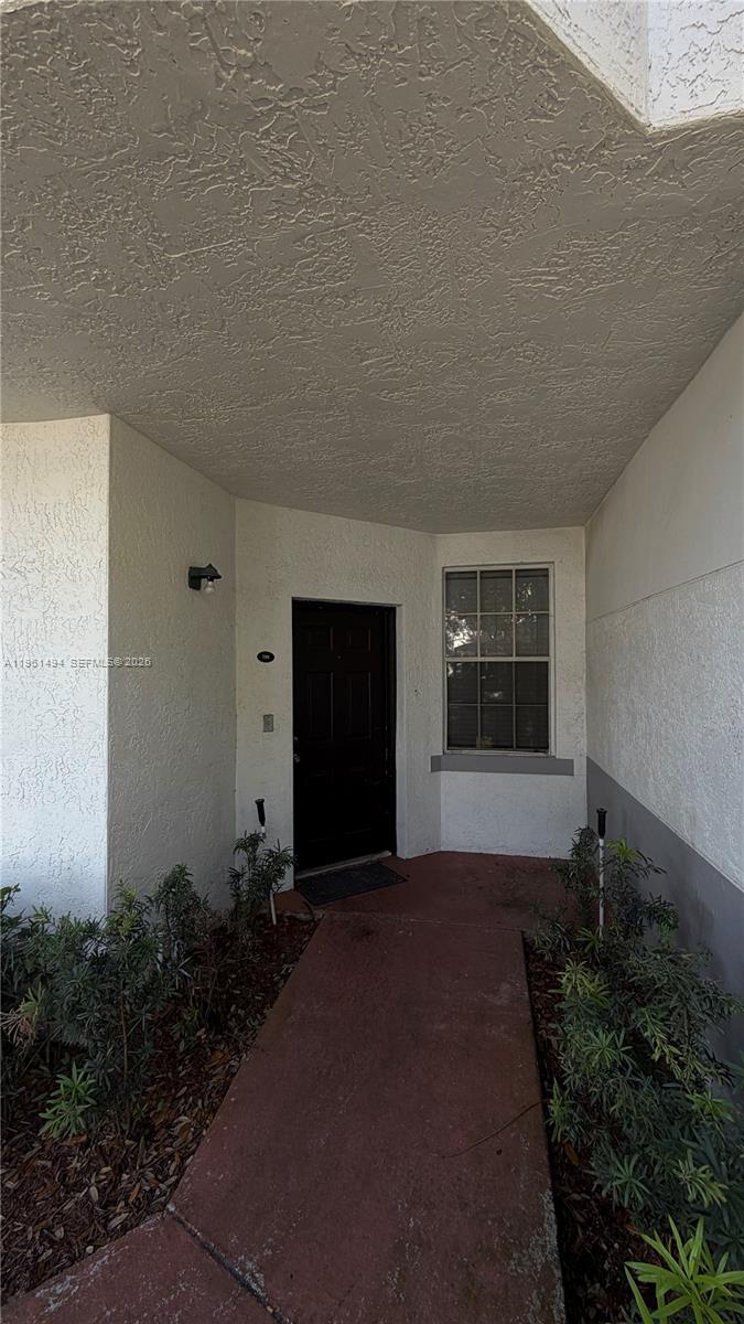741 Southwest 148th Avenue, Unit 705 Sunrise, FL 33325 - Photo 3 of 32 a living room with furniture
