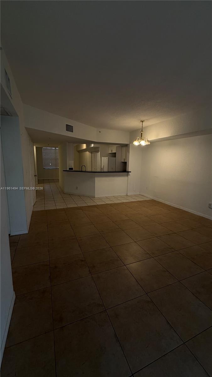 741 Southwest 148th Avenue, Unit 705 Sunrise, FL 33325 - Photo 10 of 32 a view of a glass room