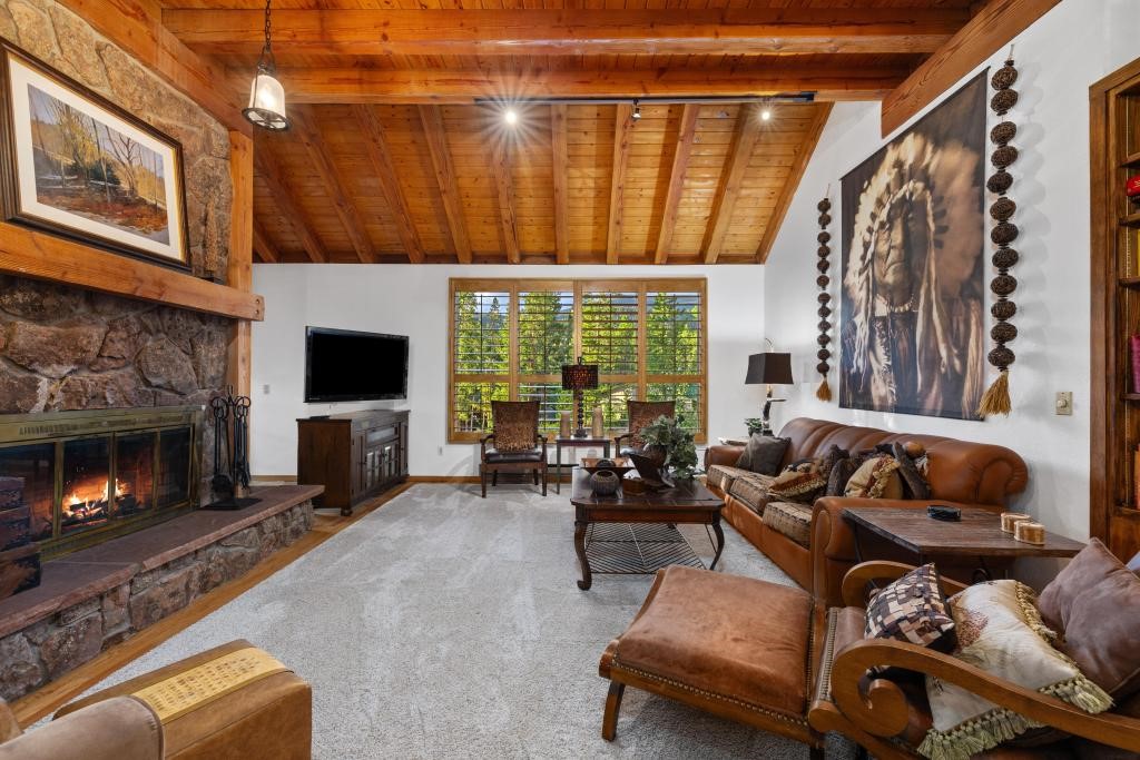 82 Lenawee Lane Keystone, CO 80435 - Photo 23 of 39 a living room with furniture and a fireplace
