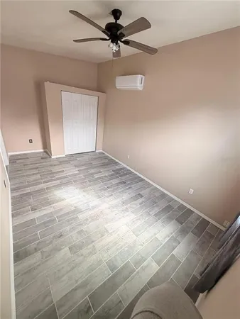 a view of a big room with carpet