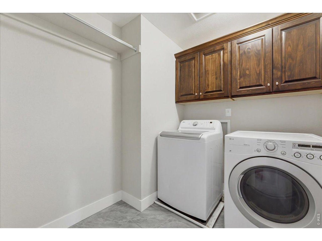 1148 Wagon Bend Road Berthoud, CO 80513 - Photo 23 of 50 a view of storage and utility room with washer and dryer