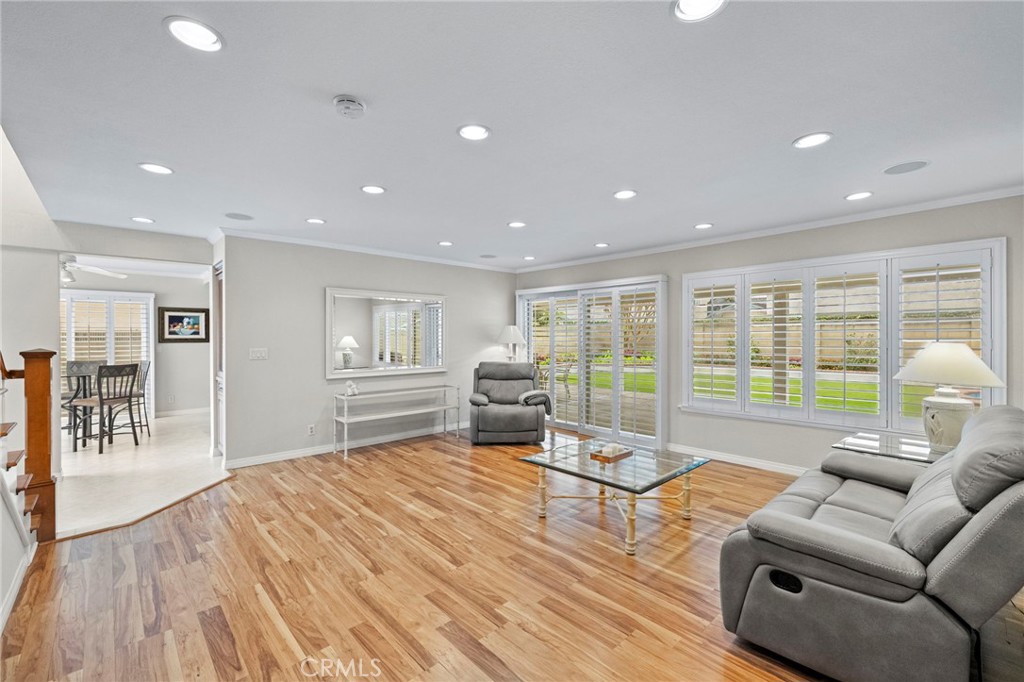 2342 Caper Tree Drive Tustin, CA 92780 - Photo 11 of 44 a living room with furniture and wooden floor