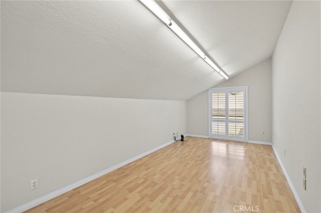 2342 Caper Tree Drive Tustin, CA 92780 - Photo 39 of 44 wooden floor in an empty room with a window