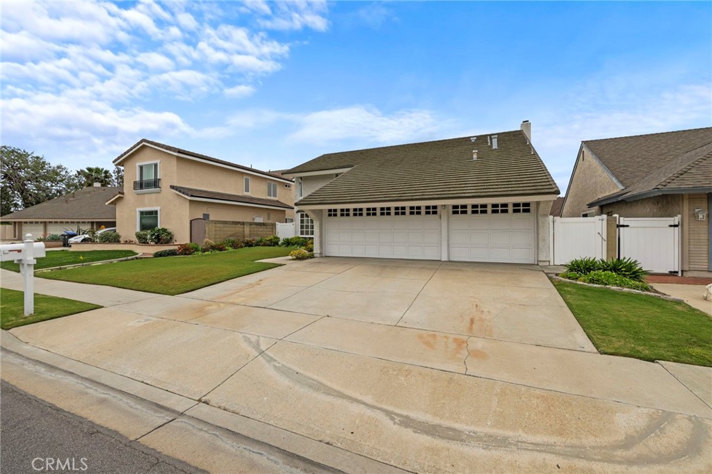 2342 Caper Tree Drive Tustin, CA 92780 - Photo 43 of 44 a view of house with yard
