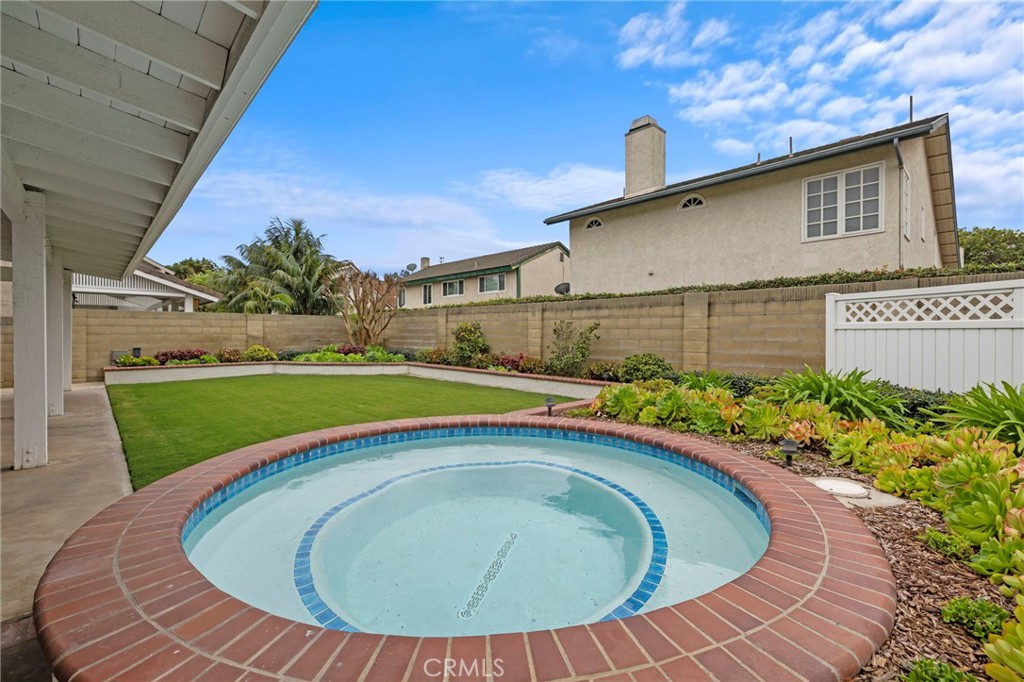 2342 Caper Tree Drive Tustin, CA 92780 - Photo 5 of 44 a view of a house with a swimming pool