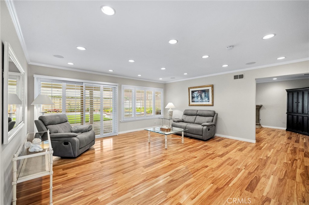 2342 Caper Tree Drive Tustin, CA 92780 - Photo 10 of 44 a living room with furniture and a wooden floor