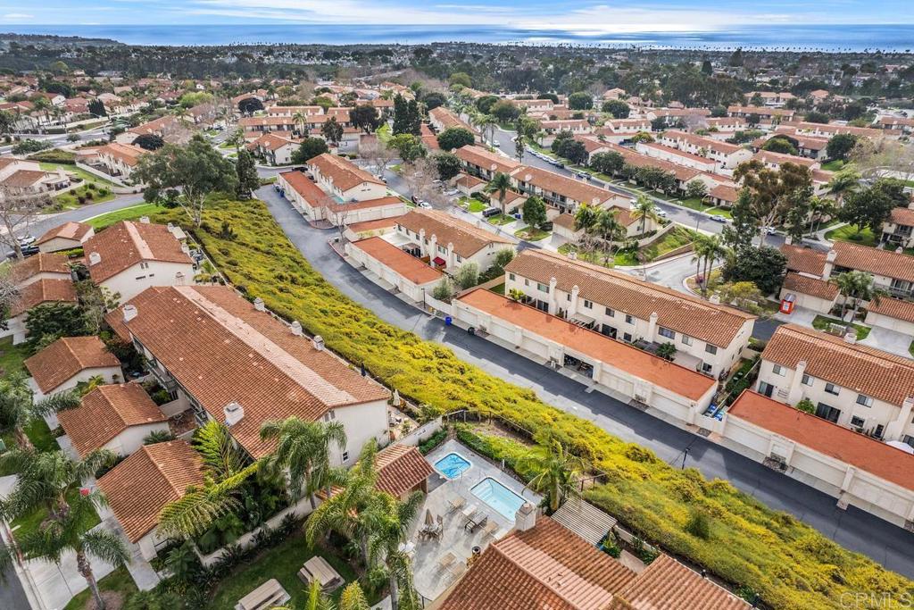 6868 Pear Tree Drive Carlsbad, CA 92011 - Photo 33 of 40 an aerial view of residential building and lake