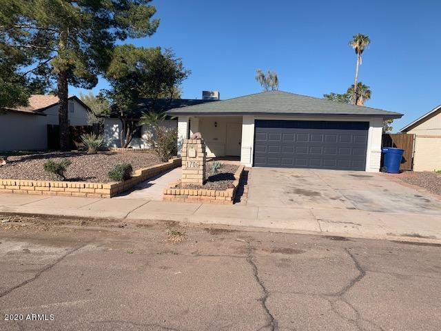 1706 West Colt Road Chandler, AZ 85224 - Photo 1 of 35 a view of a house with a snow in the background