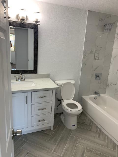 1706 West Colt Road Chandler, AZ 85224 - Photo 12 of 35 a bathroom with a sink toilet a mirror and shower