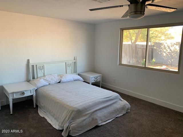 1706 West Colt Road Chandler, AZ 85224 - Photo 15 of 35 a bedroom with a bed and window