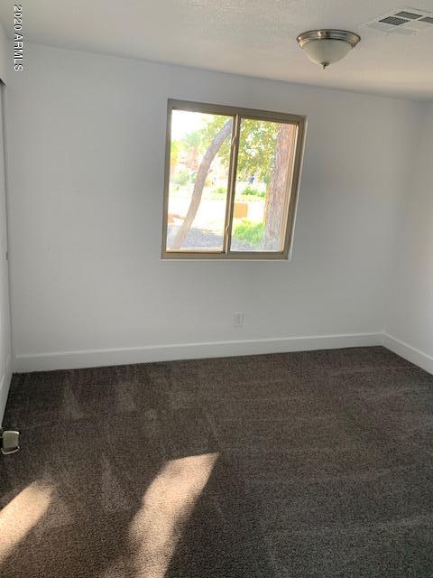 1706 West Colt Road Chandler, AZ 85224 - Photo 16 of 35 an empty room with a window