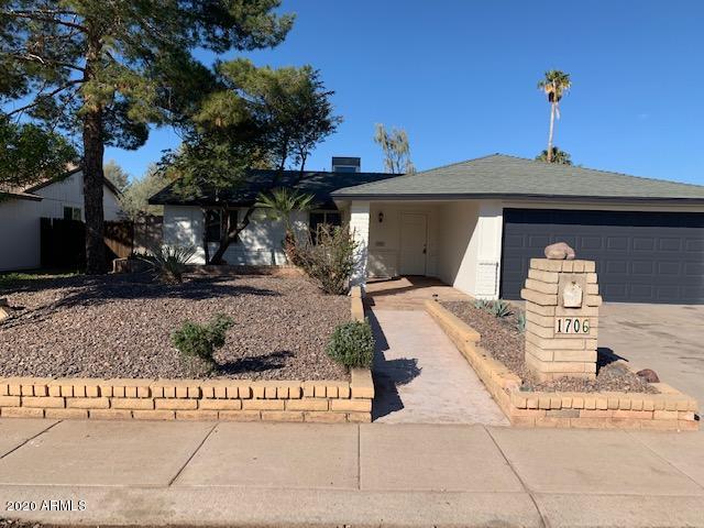 1706 West Colt Road Chandler, AZ 85224 - Photo 26 of 35 a front view of a house with garden