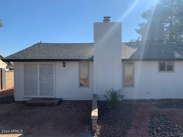 1706 West Colt Road Chandler, AZ 85224 - Photo 29 of 35 a house with a yard