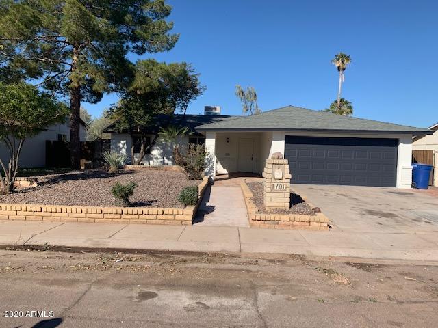 1706 West Colt Road Chandler, AZ 85224 - Photo 34 of 35 a view of a house with a yard