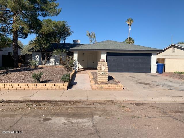 1706 West Colt Road Chandler, AZ 85224 - Photo 35 of 35 a view of a house with a street