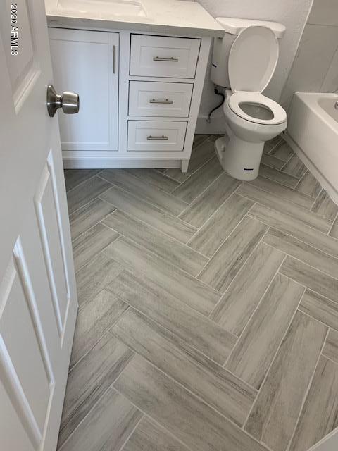 1706 West Colt Road Chandler, AZ 85224 - Photo 10 of 35 a bathroom with a toilet and a shower
