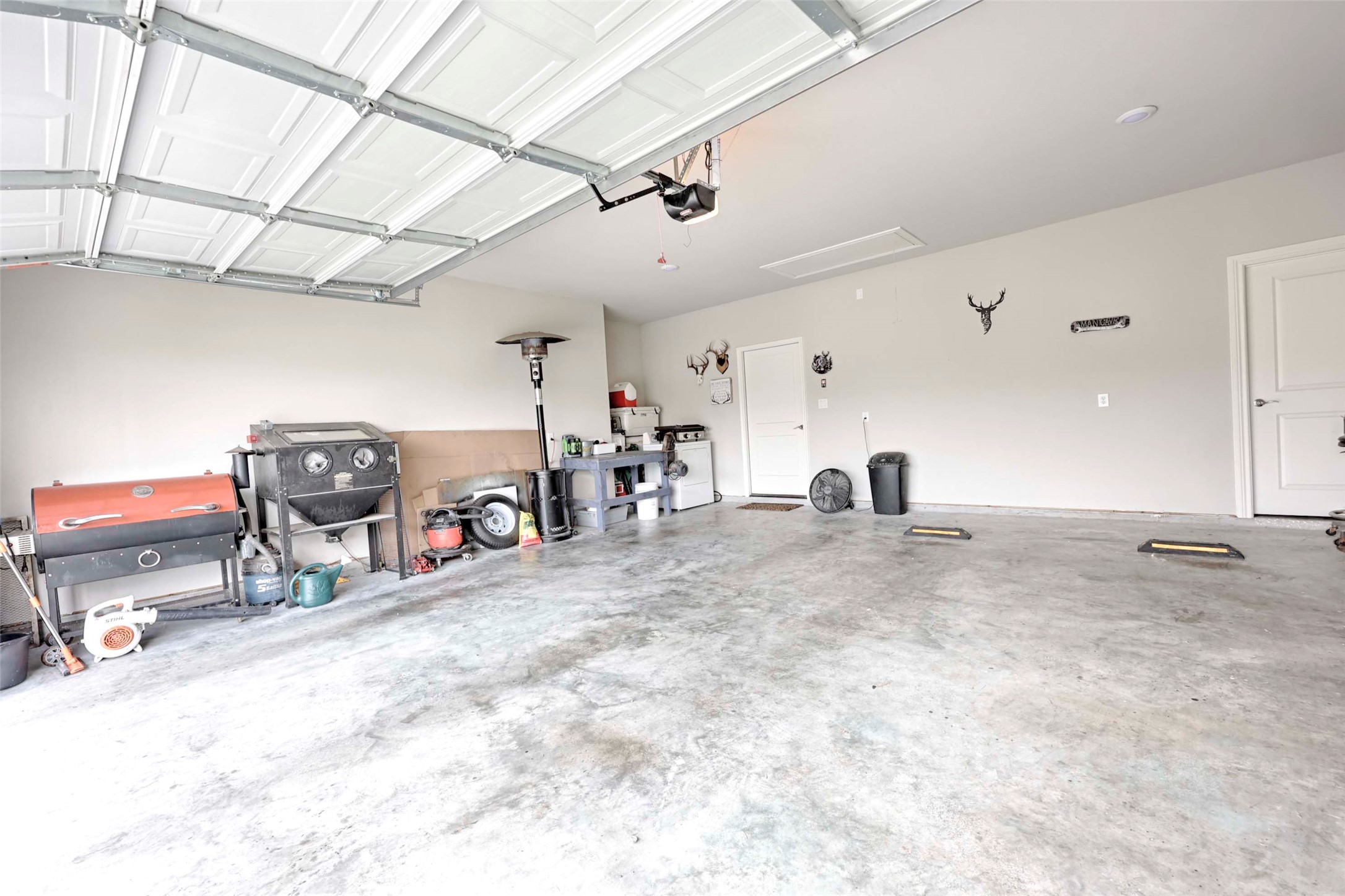 206 East Hinton Road Weimar, TX 78962 - Photo 19 of 22 a view of a garage