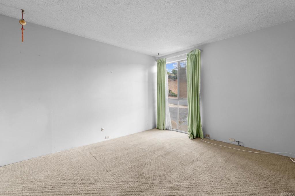 1696 Bartram Way El Cajon, CA 92019 - Photo 14 of 35 a view of an empty room and window