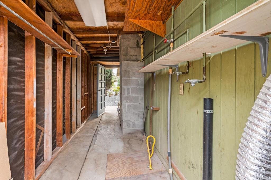 1696 Bartram Way El Cajon, CA 92019 - Photo 21 of 35 a view of a porch with wooden walls