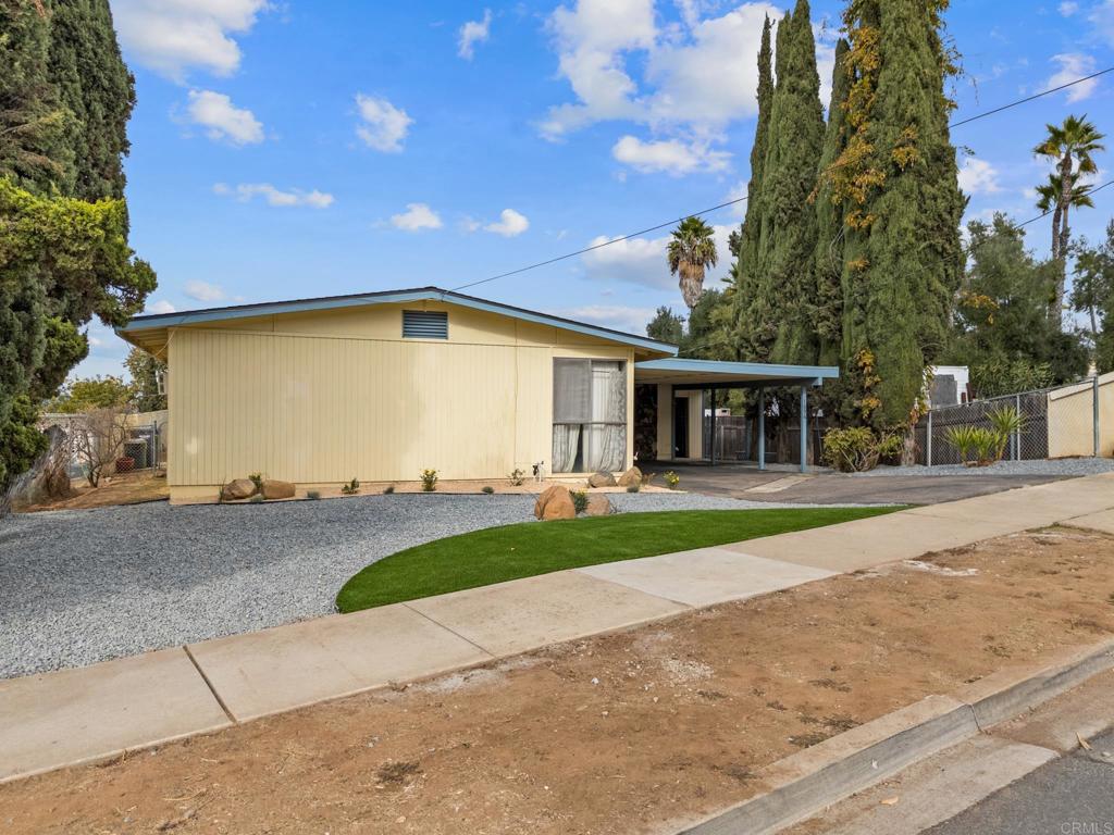 1696 Bartram Way El Cajon, CA 92019 - Photo 23 of 35 front view of a house with a yard