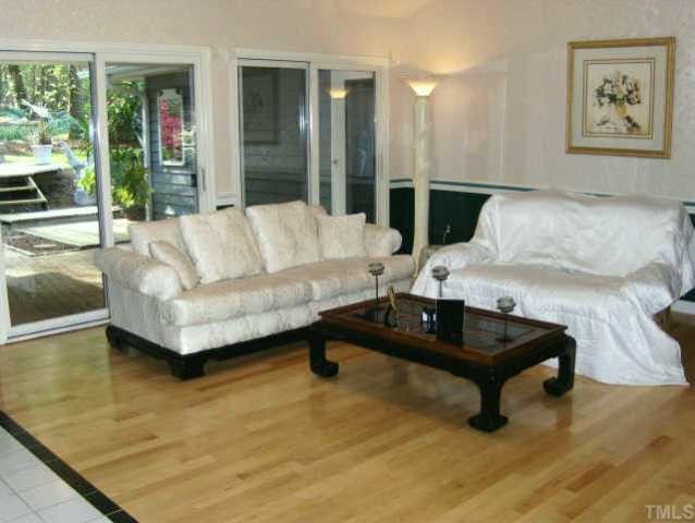 120 Singleton Street Raleigh, NC 27606 - Photo 4 of 12 a living room with furniture and a table