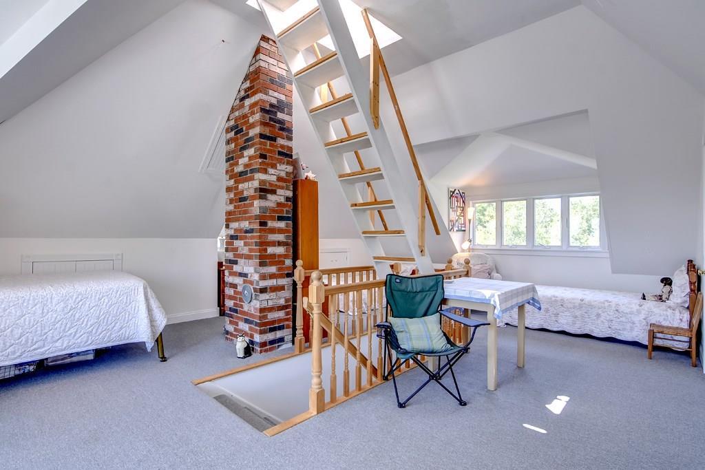 1307 Newbury Neck Road Surry, ME 04684 - Photo 29 of 38 Third floor dormitory with steps up...