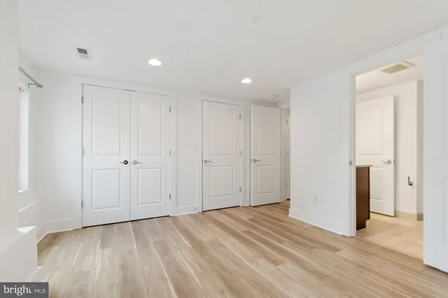 a view of a livingroom with wooden floor