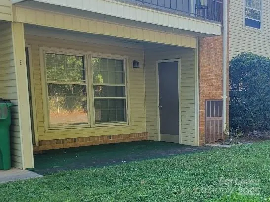 a view of a backyard of the house