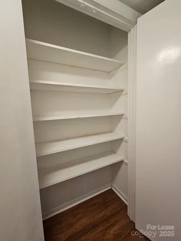 a storage room with washer and dryer