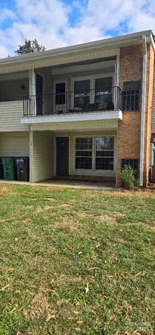 a view of a house with a garden