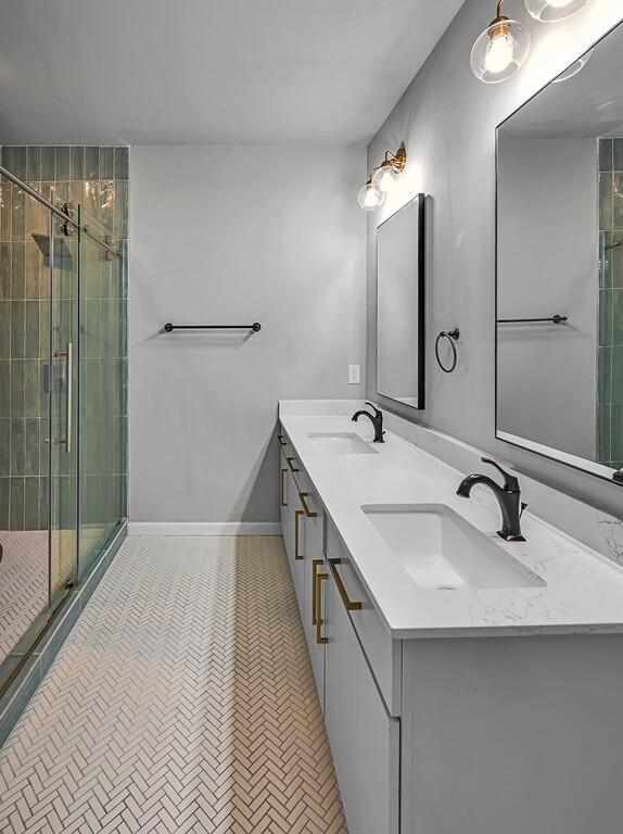 2001 Colcord Avenue Waco, TX 76707 - Photo 17 of 27 a bathroom with double vanity and a tub