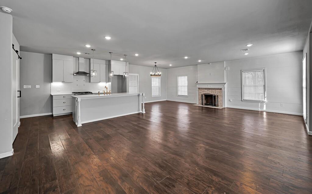 2001 Colcord Avenue Waco, TX 76707 - Photo 3 of 27 a large white kitchen with lots of counter space and a sink